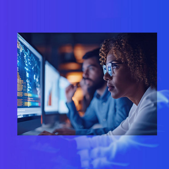 Focused diverse colleagues analyzing data banner