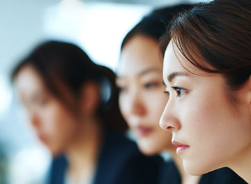Focused professional in a corporate setting with blue background