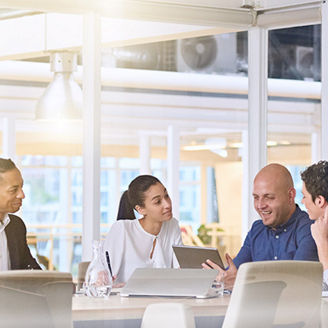 Four people in a meeting