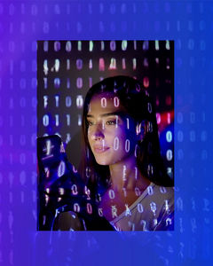 Woman looks at screen