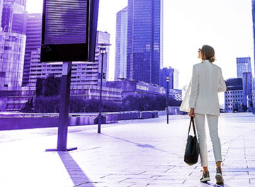 Woman runs across square