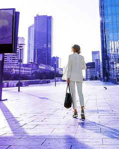 Woman runs across square