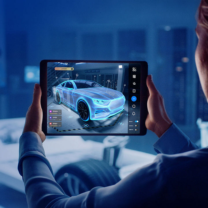 Woman with a car hologram on a tablet