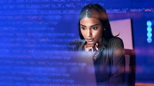 Laptop, code hologram and woman thinking of data analytics, information technology or software overlay at night. Computer and IT people solution with algorithm, statistics and cybersecurity research