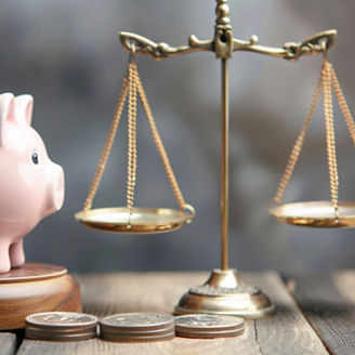 Piggy Bank Symbolizing Financial Fraud Near Scales of Justice