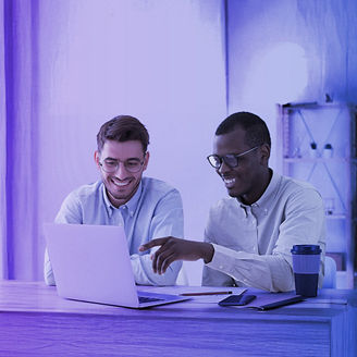 Two men in conversation on a laptop