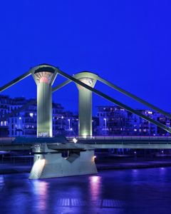 Building and bridge at night