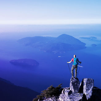 Man standing on mountain rock