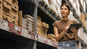 Girl looking at boxes in store