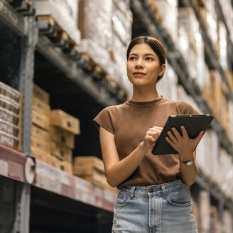 Girl looking at boxes in store