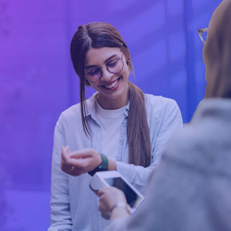 Girl making a payment with her smart watch