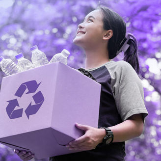 Girl recycling plastic bottles