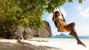 woman swing island beach