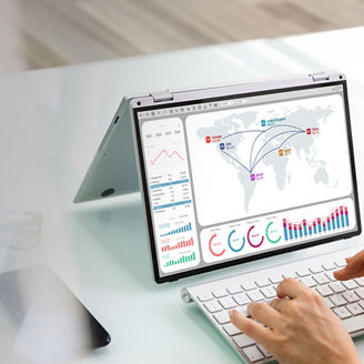 Laptop with visualisation of global flows of goods
