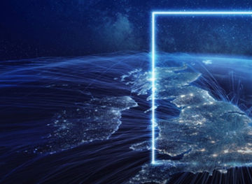 A digital view of the UK at night with illuminated data connections extending across the country