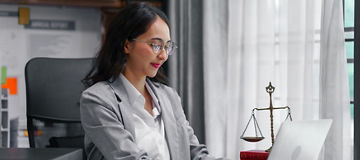 Pretty asian indian business woman as legal services across the board, legal consultant assisting clients with wide array of legal services and offerings, including appraisal and development support.