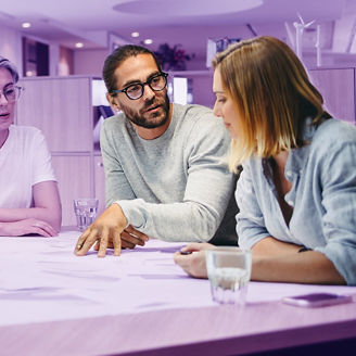 Designers sharing creative ideas during a meeting 