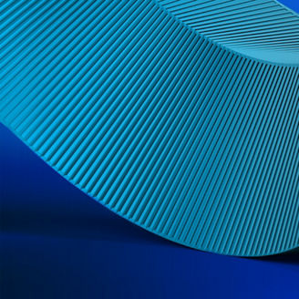 Outdoor shot of young woman using mobile phone outdoors in the city. Female business professional using smart phone in the city.