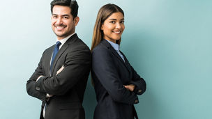 Latin confident professionals in suit standing against isolated background