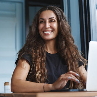 Young businesswoman manage business from home on remote, freelancer using laptop sit kitchen table on self-quarantine, work over personal growth, apply for online courses to learn new skills.