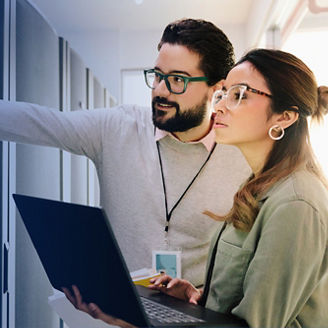 colleagues checking the server equipment