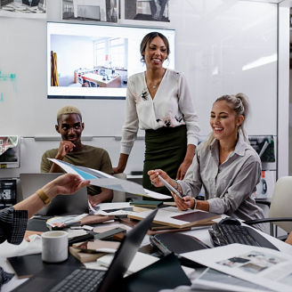 Creatives and designers in team planning meeting