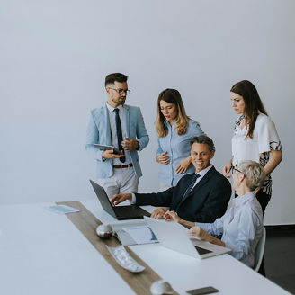 View at group of business people working together and preparing new project on a meeting in the office