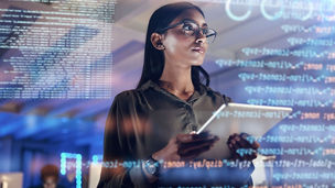 Software, coding hologram and woman on tablet thinking of data analytics, digital technology and night overlay. Programmer or IT person in glasses on 3d screen, programming and cybersecurity research.
