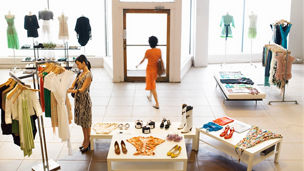Female shoppers shopping in retail boutique