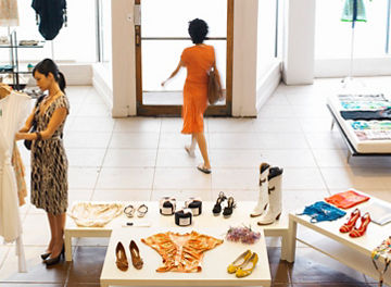 Female shoppers shopping in retail boutique