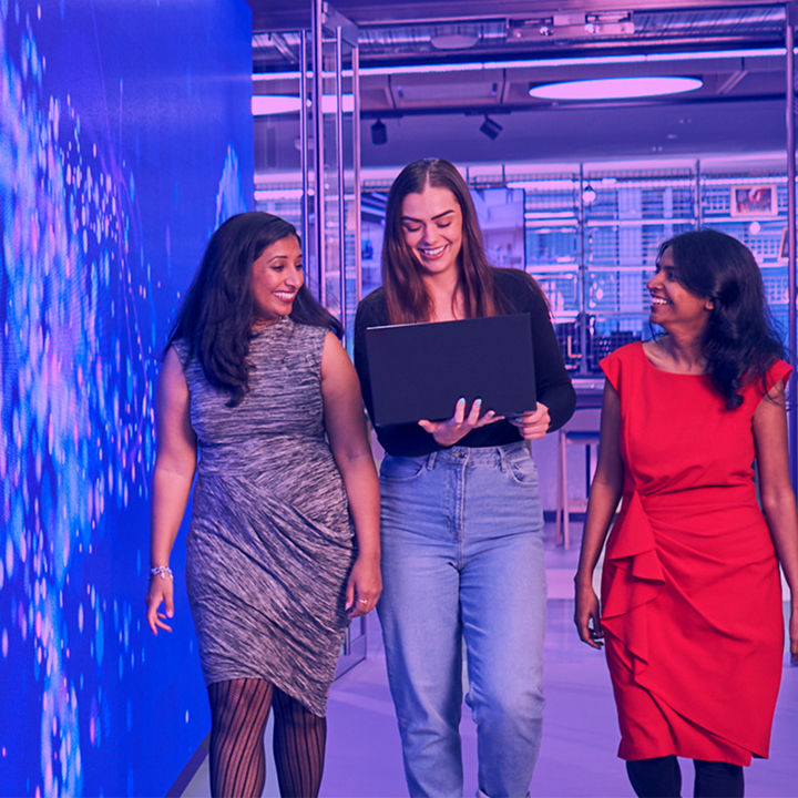 People walking together in an indoor space