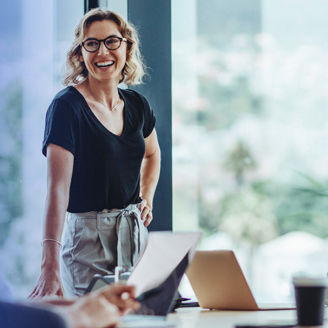 Girl smiling in a group meeting