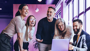 group of colleagues laughing