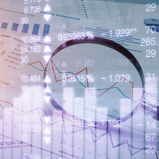 Spreadsheet bank accounts accounting with calculator and magnifying glass. Concept for financial fraud investigation, audit and analysis.