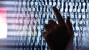 hand pointing to binary numbers