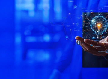 Hand with a light bulb