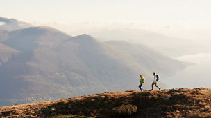 Man and woman hiking in hills