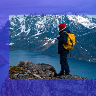 hiker on top of Norwegian mountains