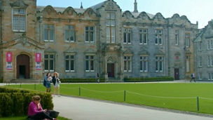 Historic stone university building with ornate architectural details