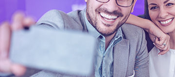 young couple taking selfie