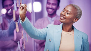 Businesswoman, planning and writing idea in meeting, calendar or agenda, sticky note or innovation. Idea, brainstorming and black woman leader with goal or problem solving, teamwork or solution; Shutterstock ID 2282908521; purchase_order: Advisory Assurance marketing team; job: Anne Rouschop; client: Hyperautomation