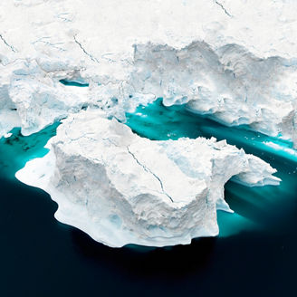 Arctic Icebergs Greenland in the arctic sea. You can easily see that iceberg is over the water surface, and below the water surface. Sometimes unbelievable that 90% of an iceberg is under water