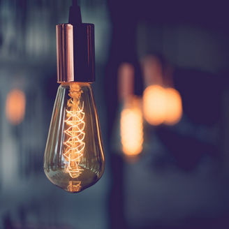 Vintage electric light.Decorative antique edison style light bulbs in coffee shop.vintage tone