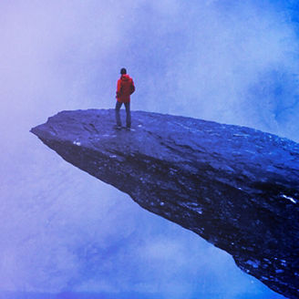 blue cliff person river