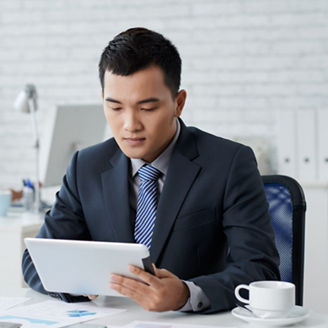 Close up man formalwear sitting office desk