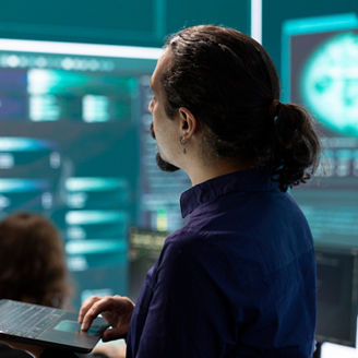 Cyber security team investigates governmental hacking malware attack on internet servers, high tech office. Cybercriminals hack computer systems, threatening account database protection.