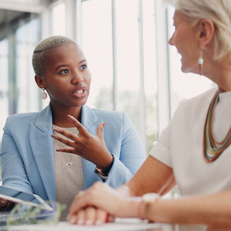 Women Engaging in a workplace conversation