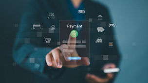 Hand pointing to payment icon on screen