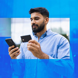 Man using smartphone to make card payment