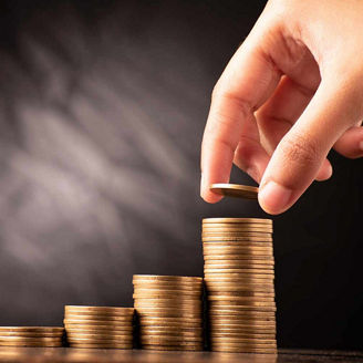 Mutual fund or systematic investment plan concept, putting coin on coin stack representing budget 2027 investment account